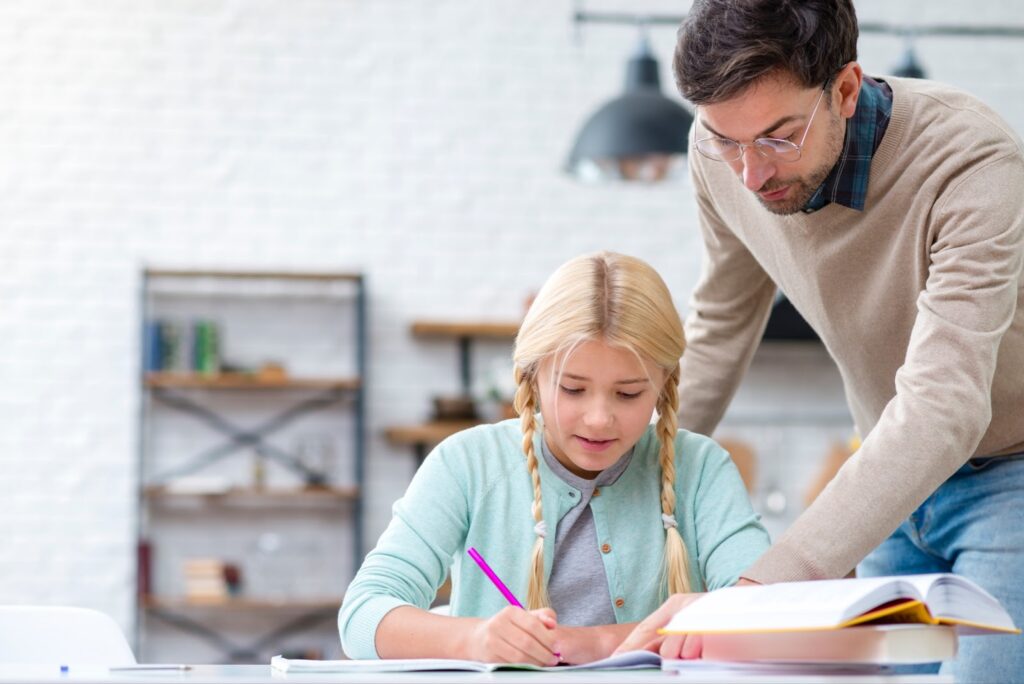 Tutor with a little girl