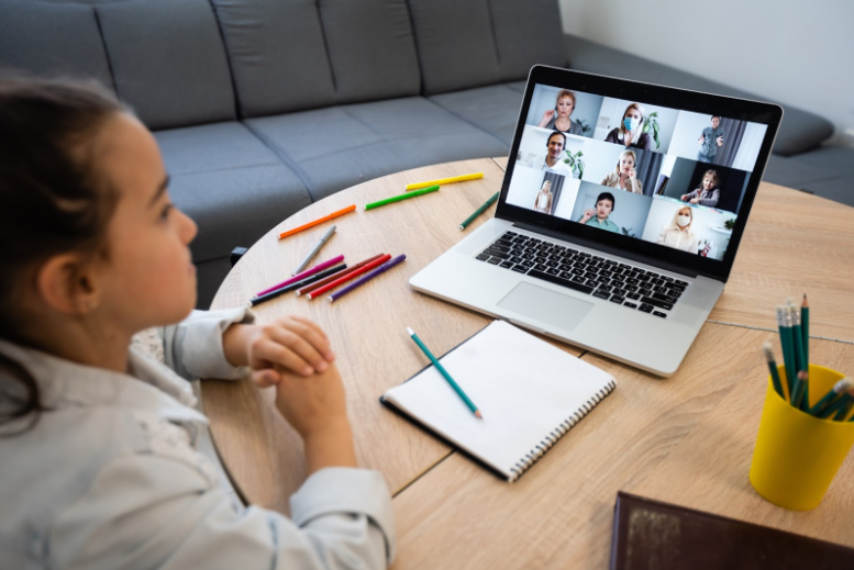 Girl attending a technology-enhanced learning online class