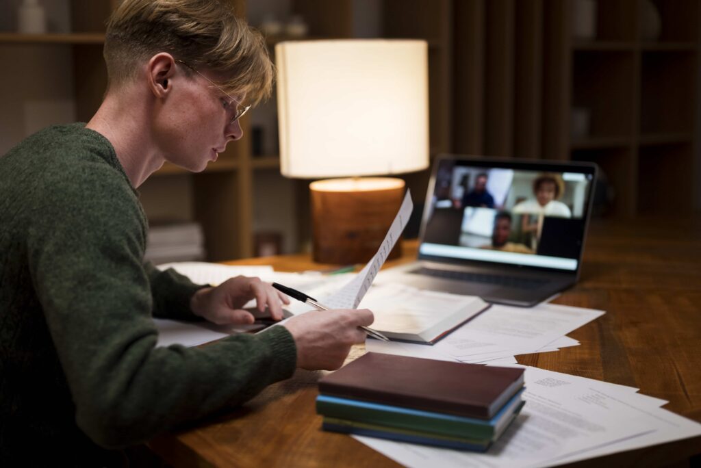 Young man in a virtual classroom powered by an education software