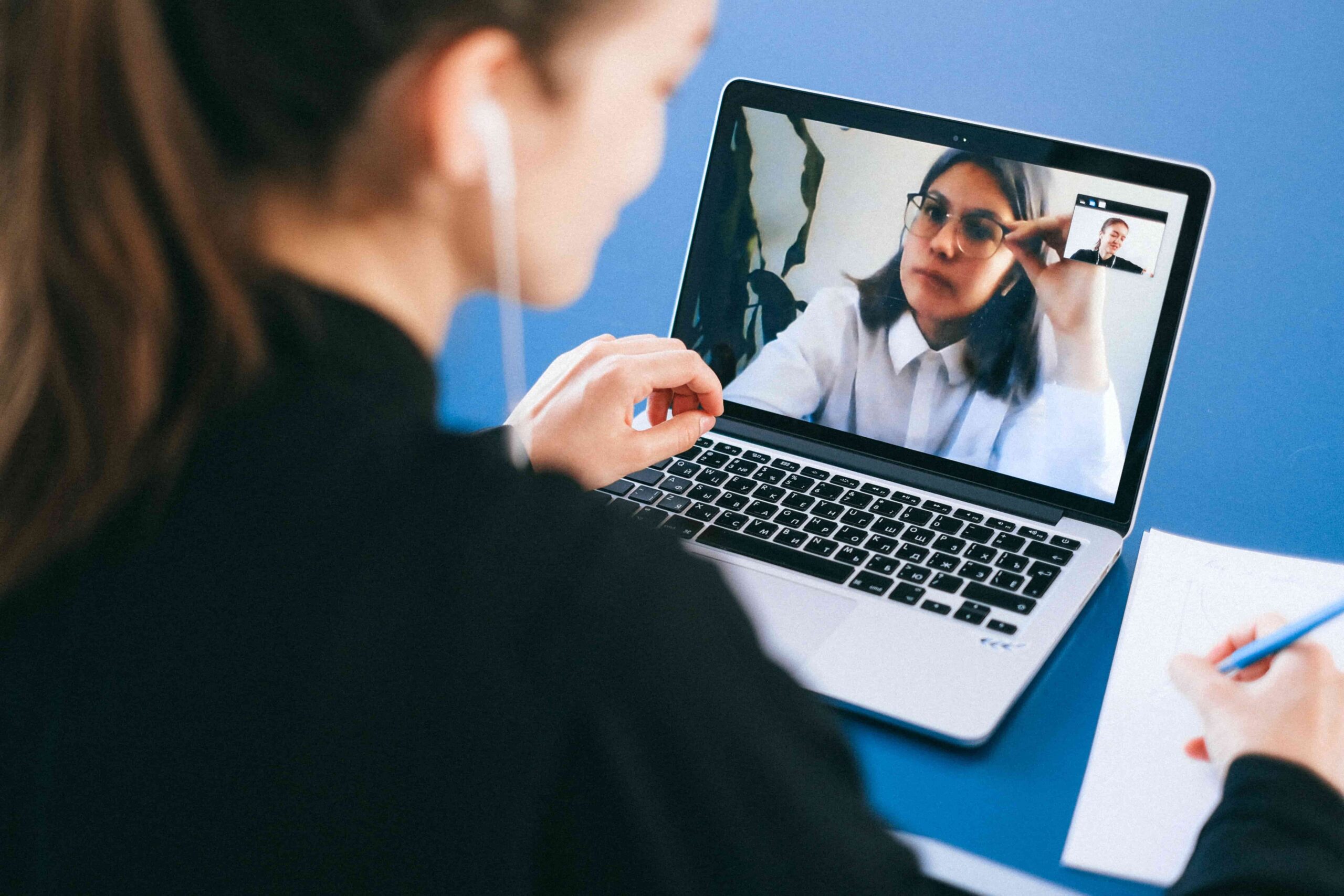 Teacher attending virtual office hours with a student