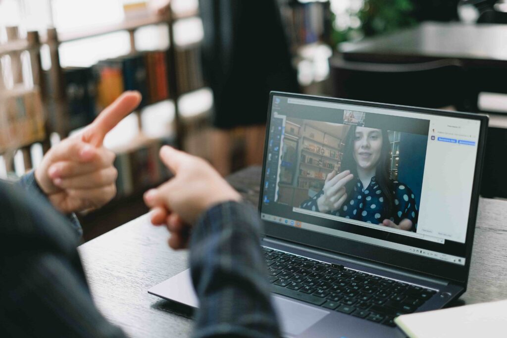 Flexible and adaptable teacher at online lesson with her student