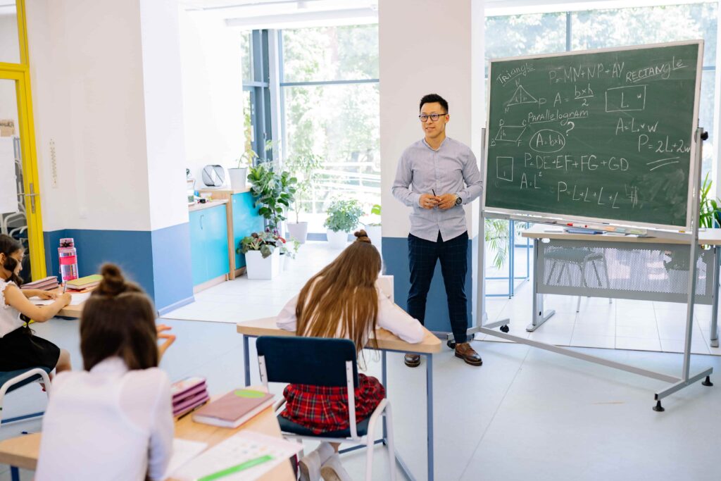 K-12 teacher explaining new lesson