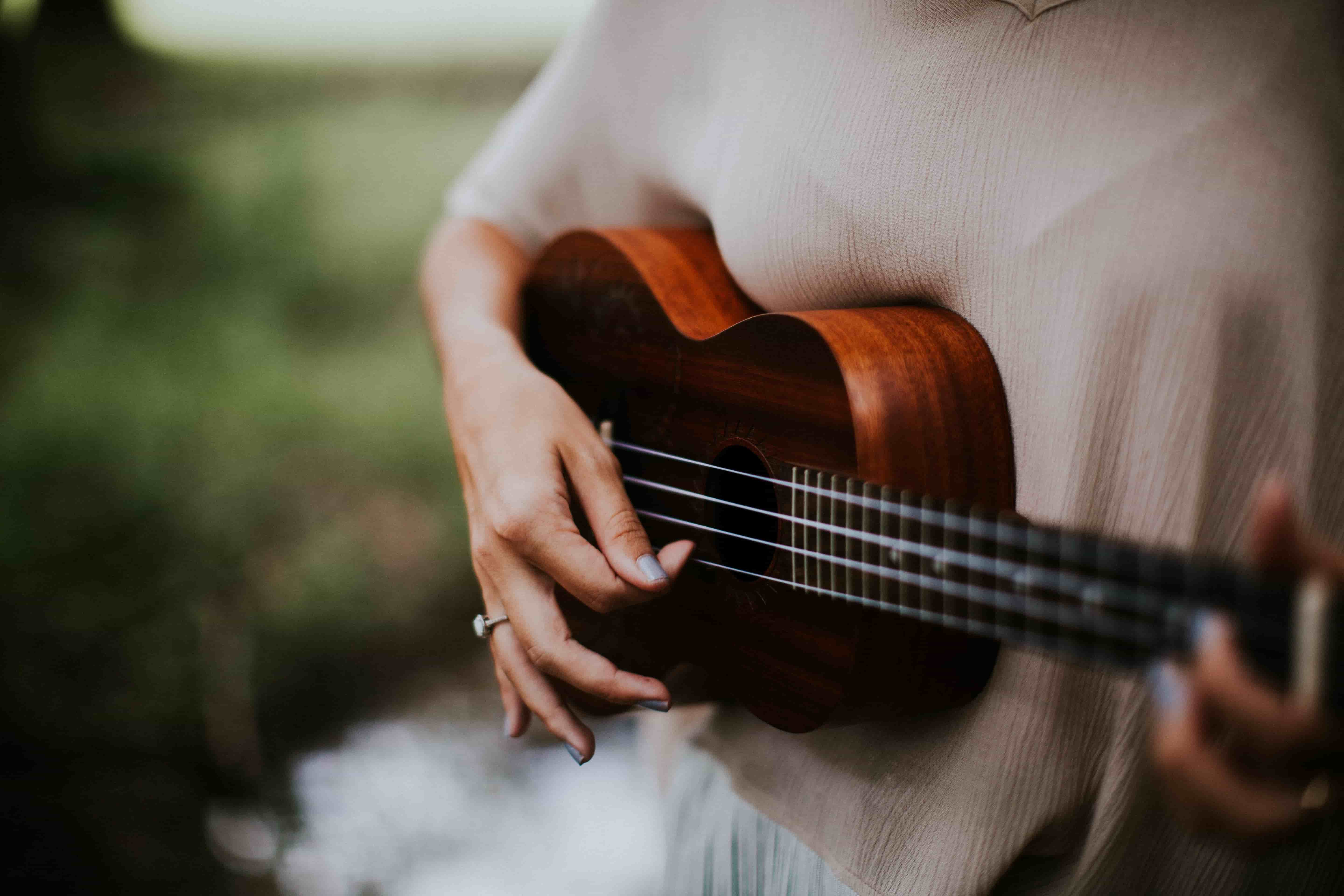 Playing the guitar at summer school