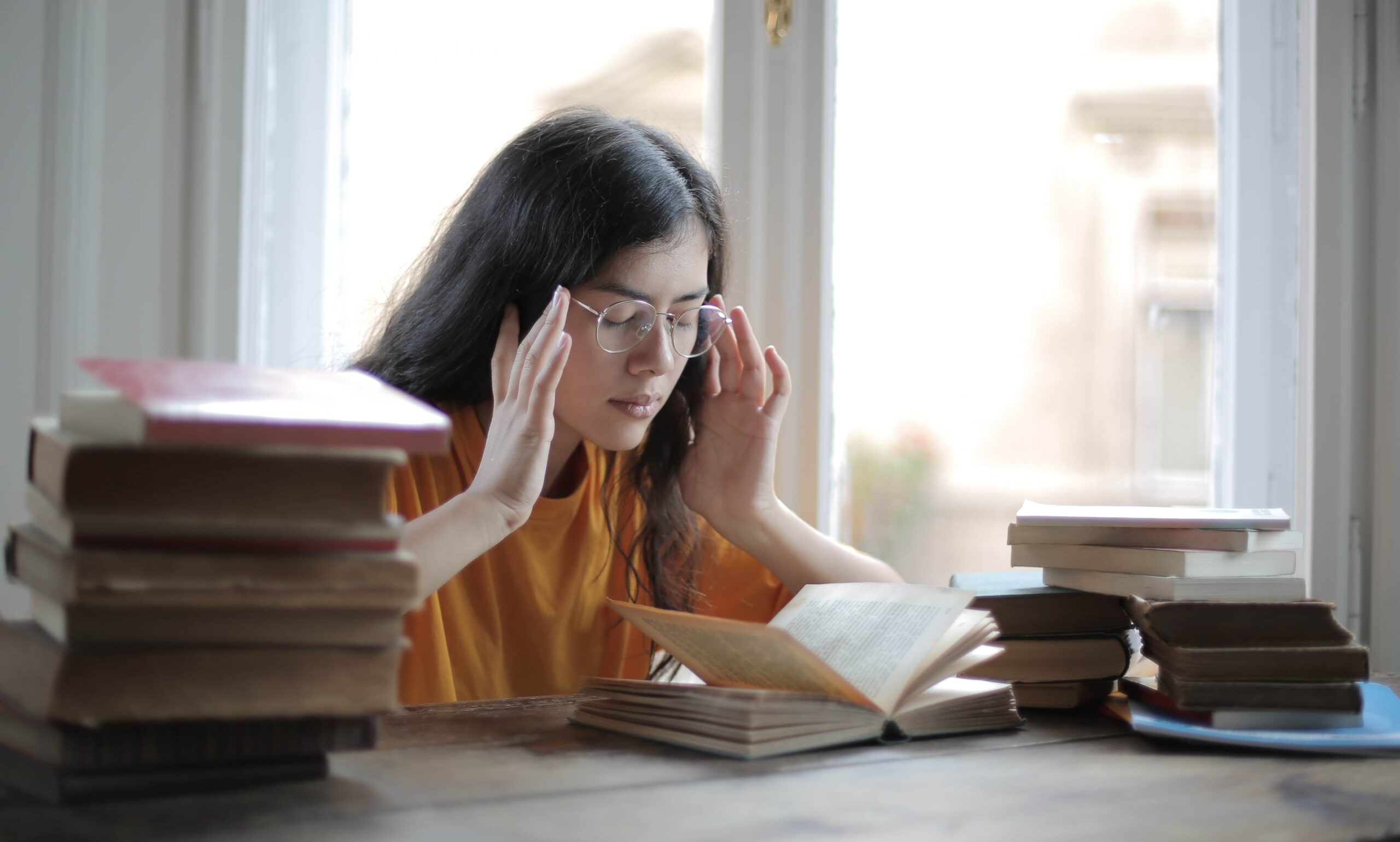 Student trying to concentrate on her lesson